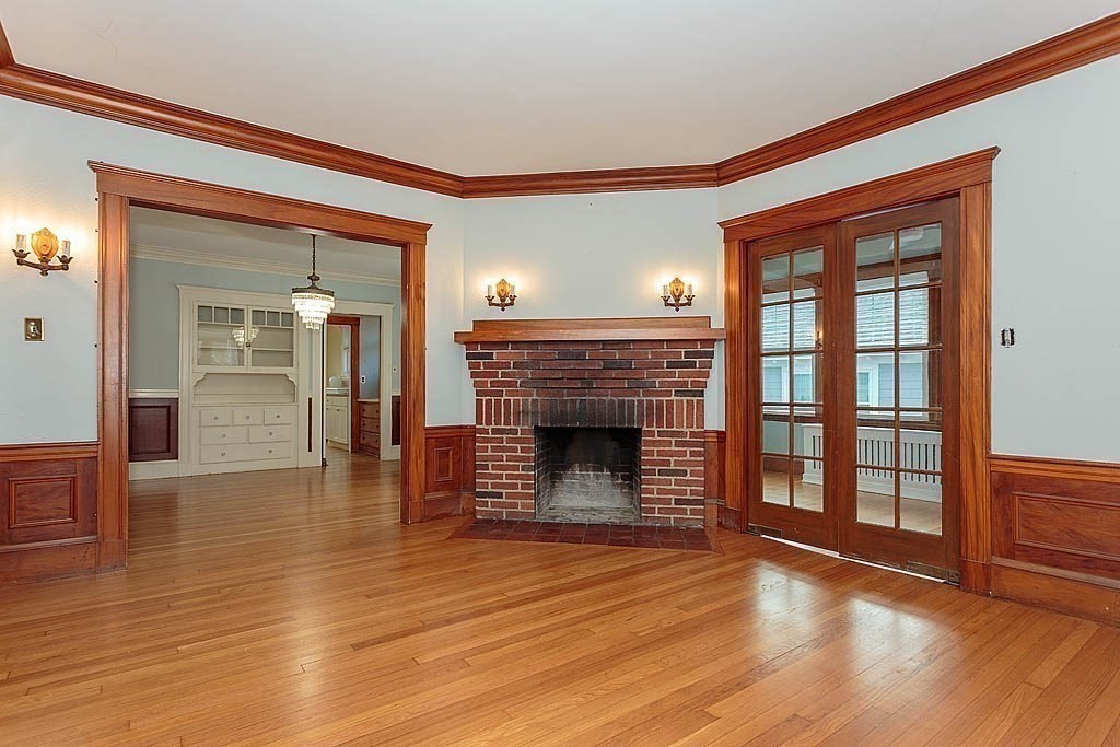 15 Fairfax Road Milton, MA 02186 - Photo 7 of 37 wooden floor fireplace and windows in an empty room