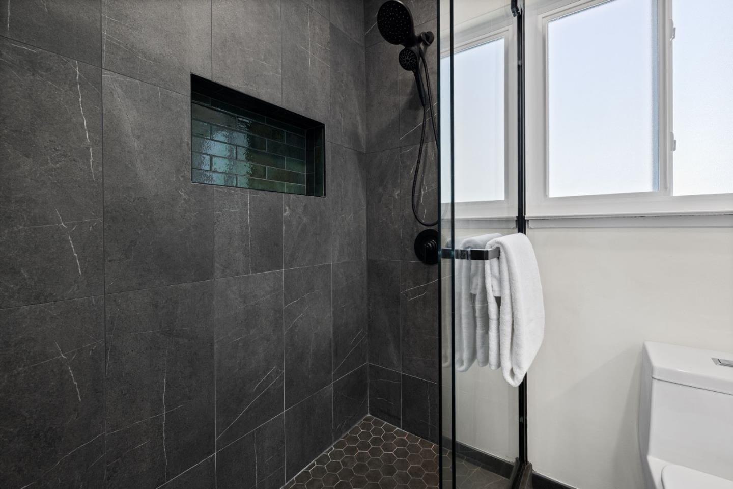 1337 Henry Street, Unit E Berkeley, CA 94709 - Photo 20 of 33 a bathroom with a shower