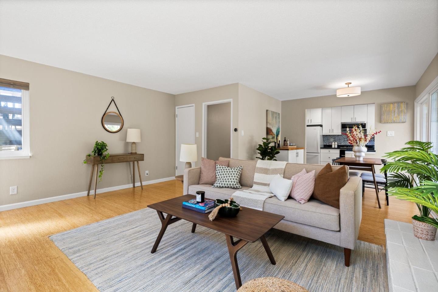 1337 Henry Street, Unit E Berkeley, CA 94709 - Photo 7 of 33 a living room with furniture and wooden floor