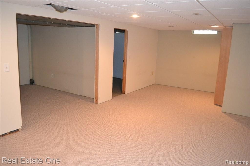 709 Denham Lane Rochester, MI 48307 - Photo 14 of 18 Finished Basement