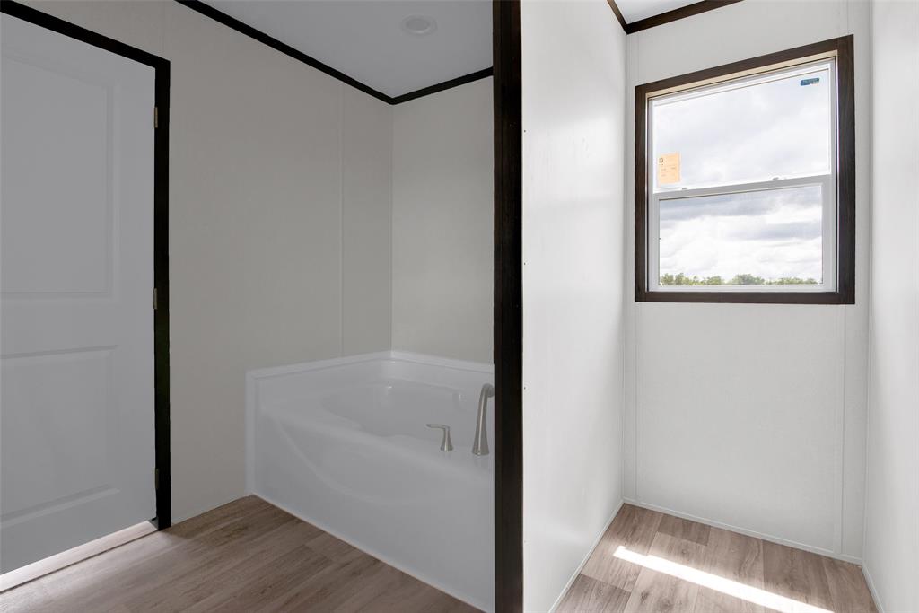 1203 Old Ida Road Sherman, TX 75090 - Photo 14 of 20 a view of small space with racks on the wall