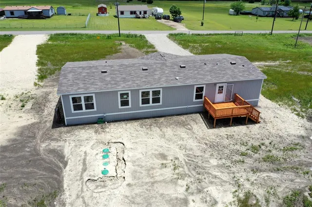 a aerial view of a house with garden