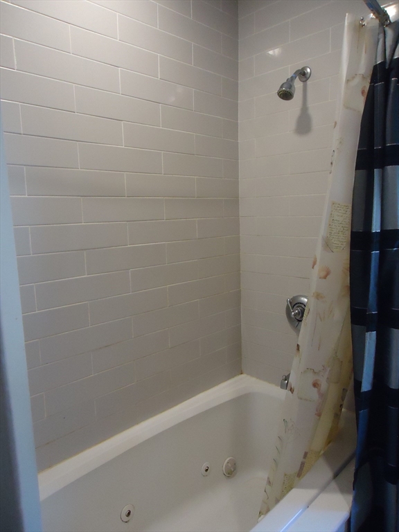 361 River Road Hudson, MA 01749 - Photo 11 of 37 a bathroom with a bathtub