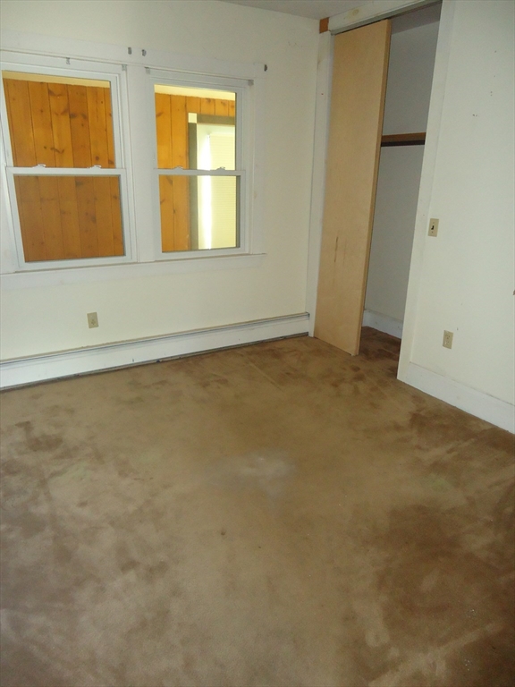 361 River Road Hudson, MA 01749 - Photo 13 of 37 an empty room with a window