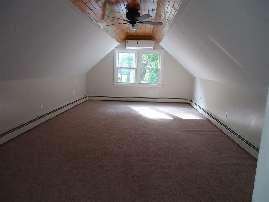 361 River Road Hudson, MA 01749 - Photo 21 of 37 an empty room that has a window