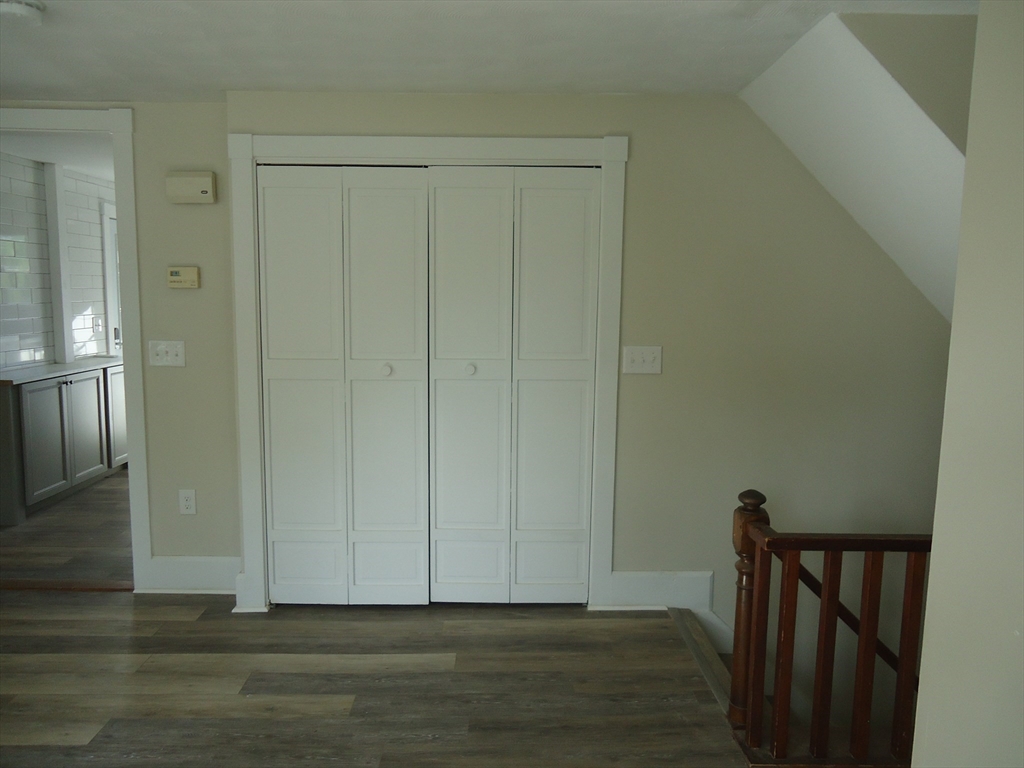 361 River Road Hudson, MA 01749 - Photo 23 of 37 a view of hallway with wooden floor