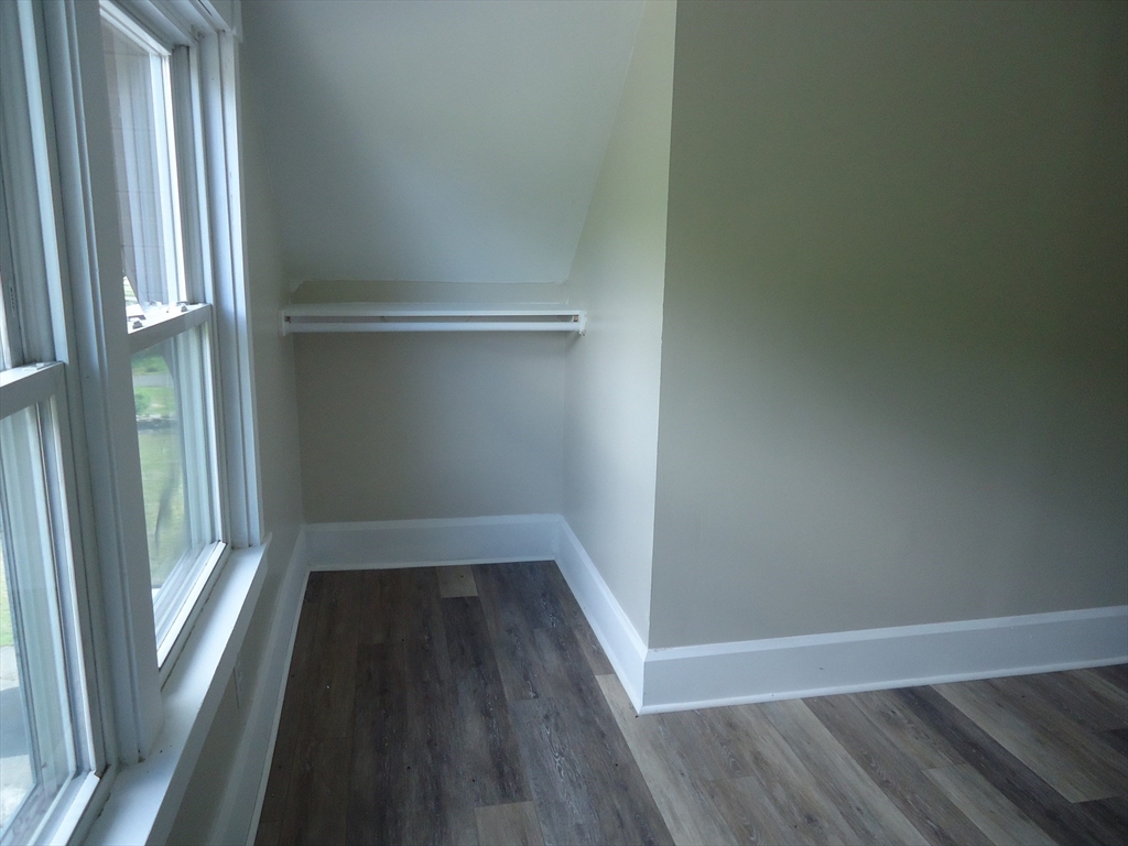 361 River Road Hudson, MA 01749 - Photo 31 of 37 a view of a small space with wooden floor and a window