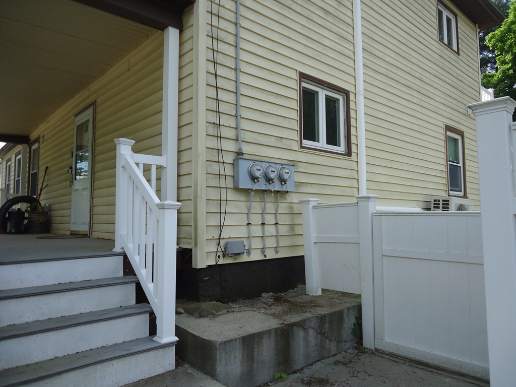 361 River Road Hudson, MA 01749 - Photo 4 of 37 a view of a entryway of the house