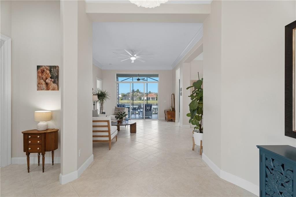 1344 Riverside Lane Vero Beach, FL 32963 - Photo 11 of 36 a view of a living room and entryway in a room
