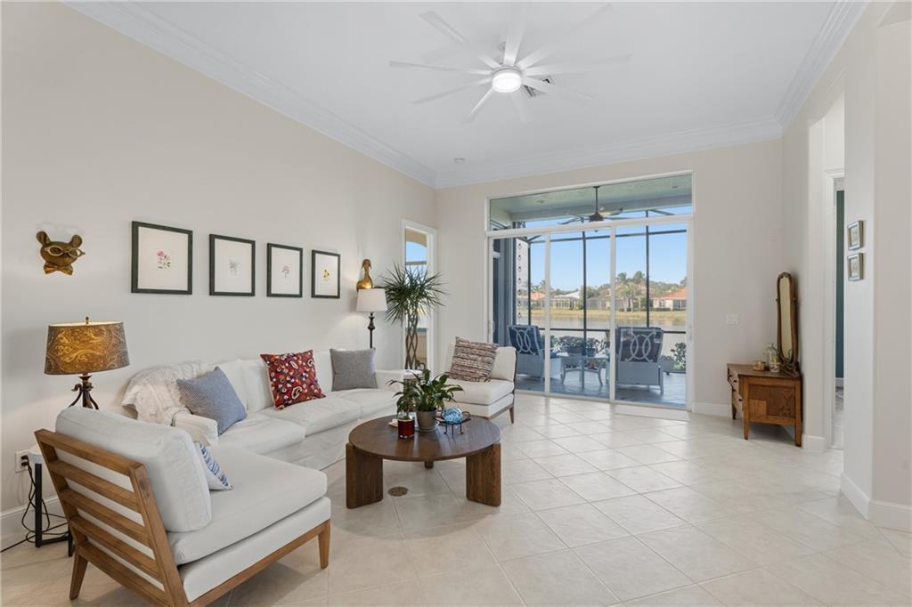 1344 Riverside Lane Vero Beach, FL 32963 - Photo 12 of 36 a living room with furniture and a table