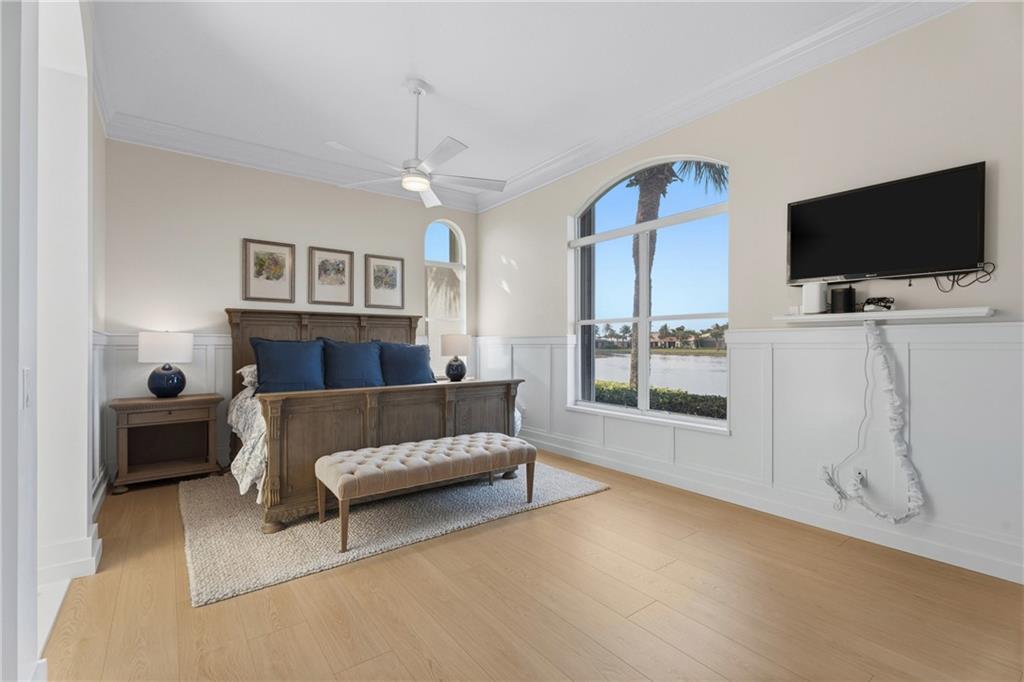 1344 Riverside Lane Vero Beach, FL 32963 - Photo 14 of 36 a living room with furniture and a flat screen tv