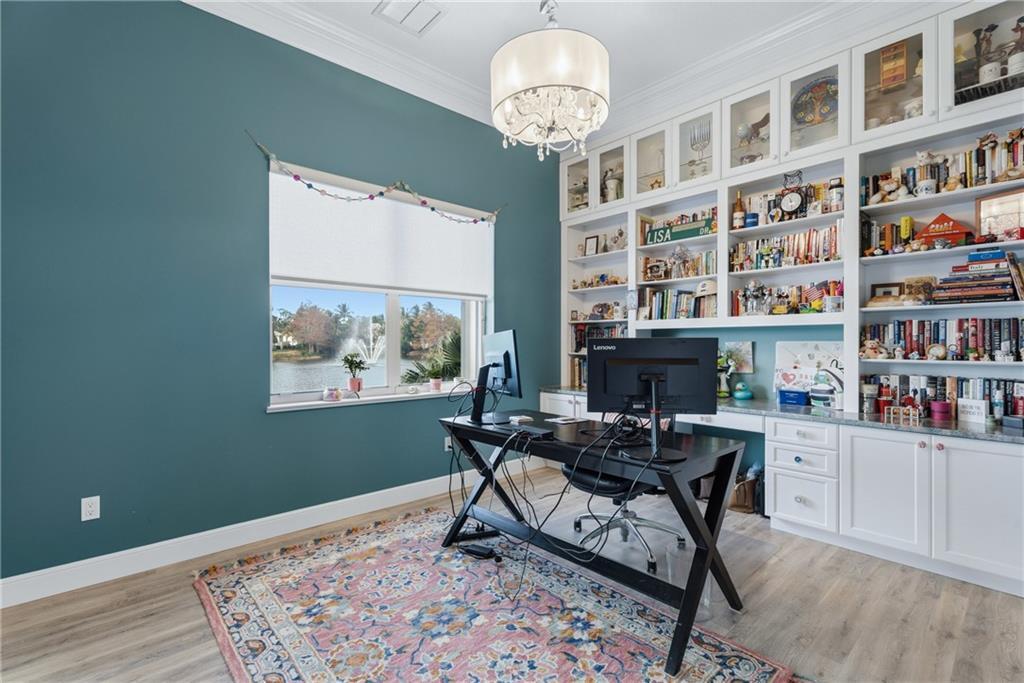 1344 Riverside Lane Vero Beach, FL 32963 - Photo 18 of 36 a workspace with wooden floor