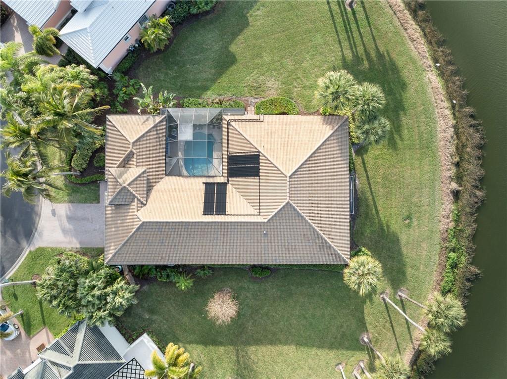 1344 Riverside Lane Vero Beach, FL 32963 - Photo 22 of 36 an aerial view of a house with a yard