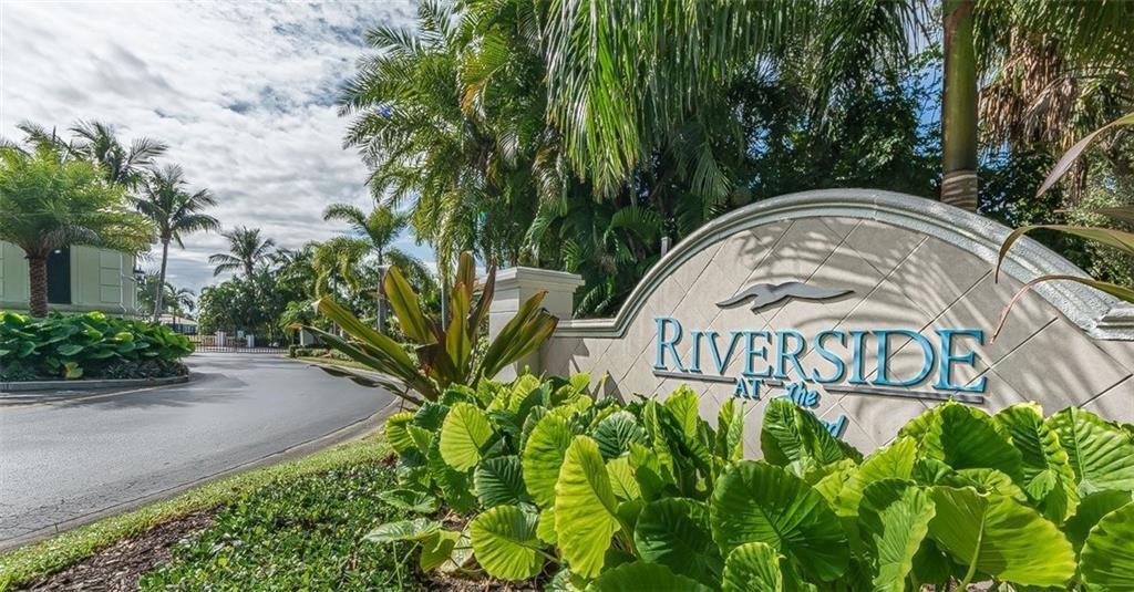 1344 Riverside Lane Vero Beach, FL 32963 - Photo 29 of 36 a view of sign board with flower plants