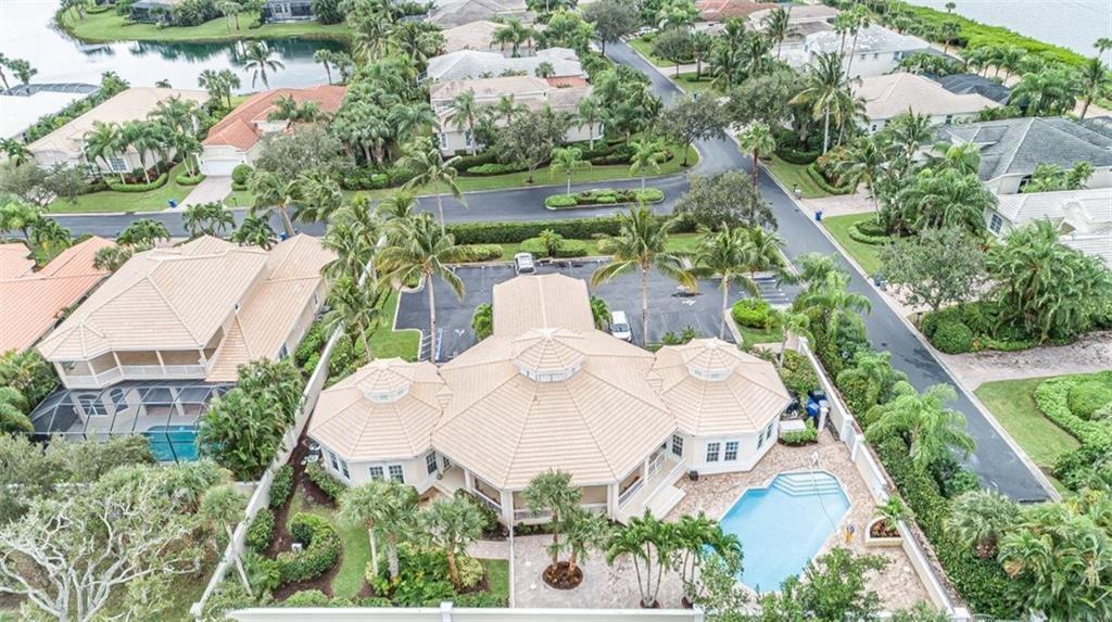 1344 Riverside Lane Vero Beach, FL 32963 - Photo 34 of 36 an aerial view of residential house with outdoor space and trees all around