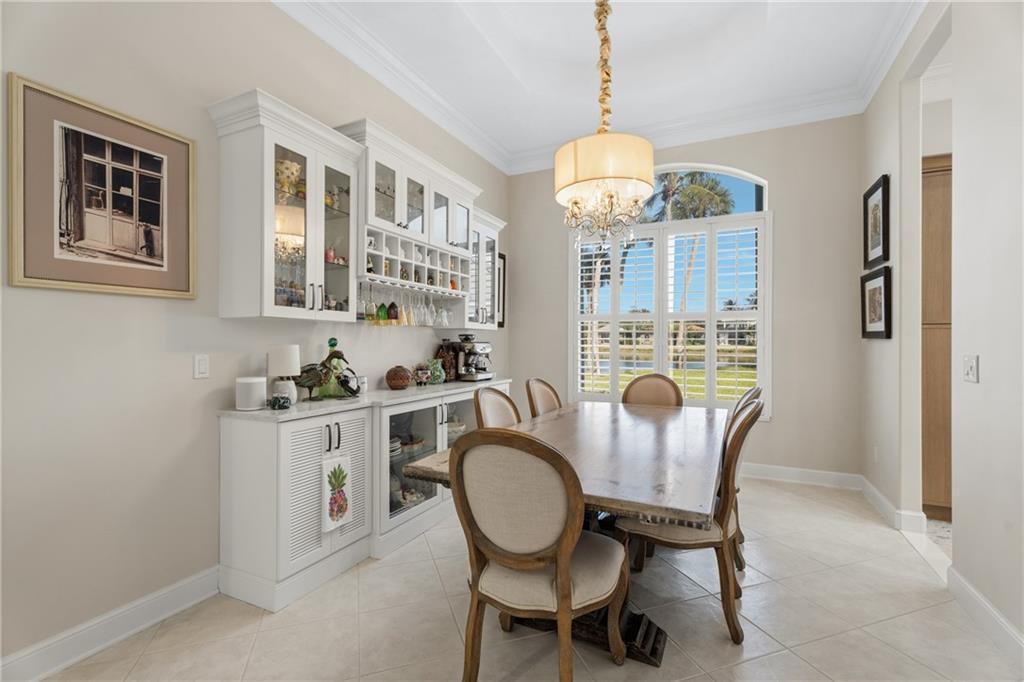 1344 Riverside Lane Vero Beach, FL 32963 - Photo 6 of 36 a view of a dining room with furniture window and outside view