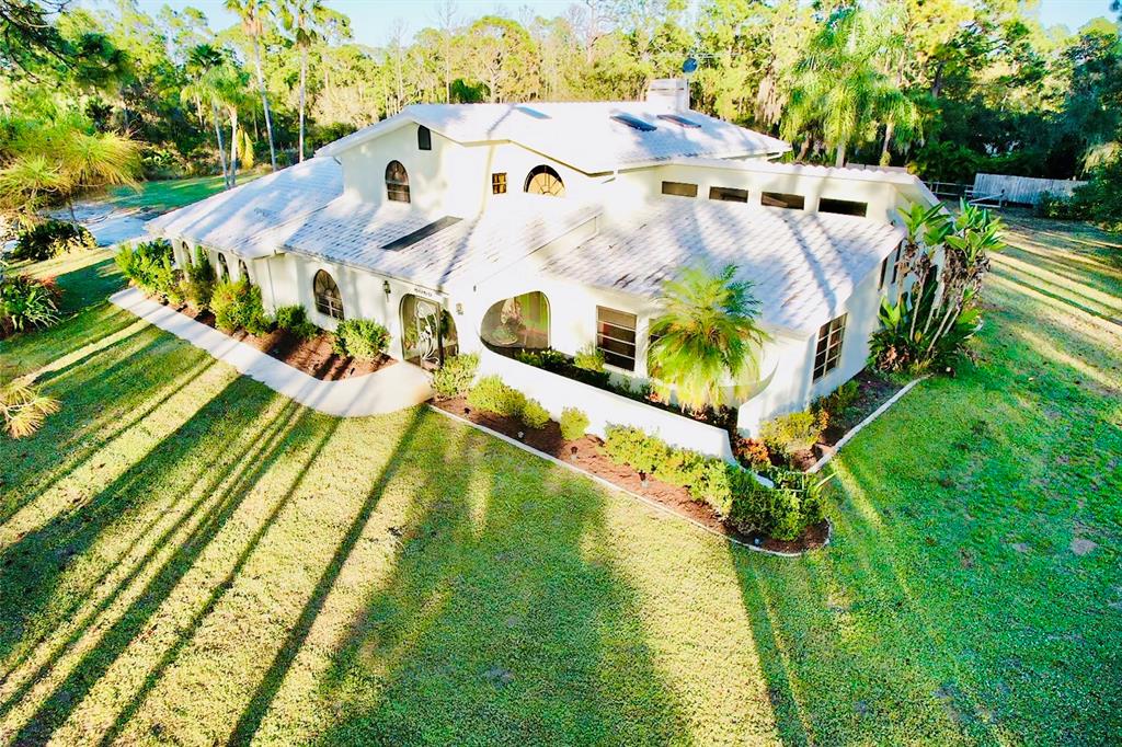 6068 Tidwell Street North Port, FL 34291 - Photo 1 of 92 a view of a swimming pool with a patio