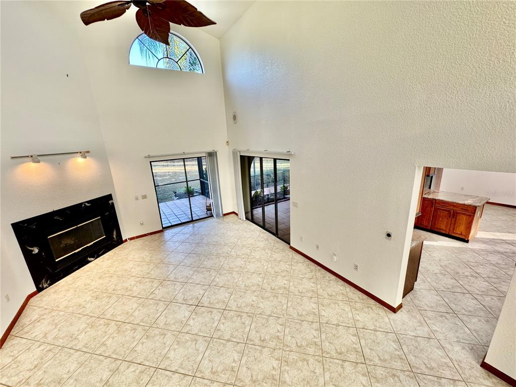 6068 Tidwell Street North Port, FL 34291 - Photo 42 of 92 a bedroom with a bed and a flat screen tv