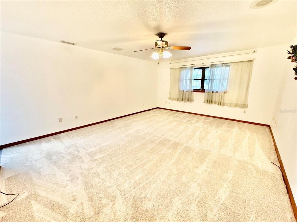 6068 Tidwell Street North Port, FL 34291 - Photo 51 of 92 a view of an empty room with a window