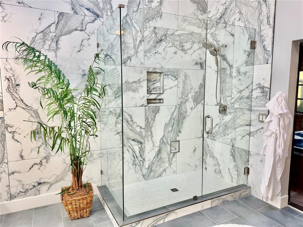 6068 Tidwell Street North Port, FL 34291 - Photo 56 of 92 a bathroom with a shower