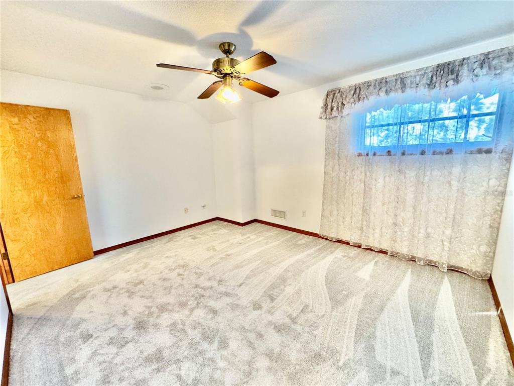 6068 Tidwell Street North Port, FL 34291 - Photo 63 of 92 a view of an empty room