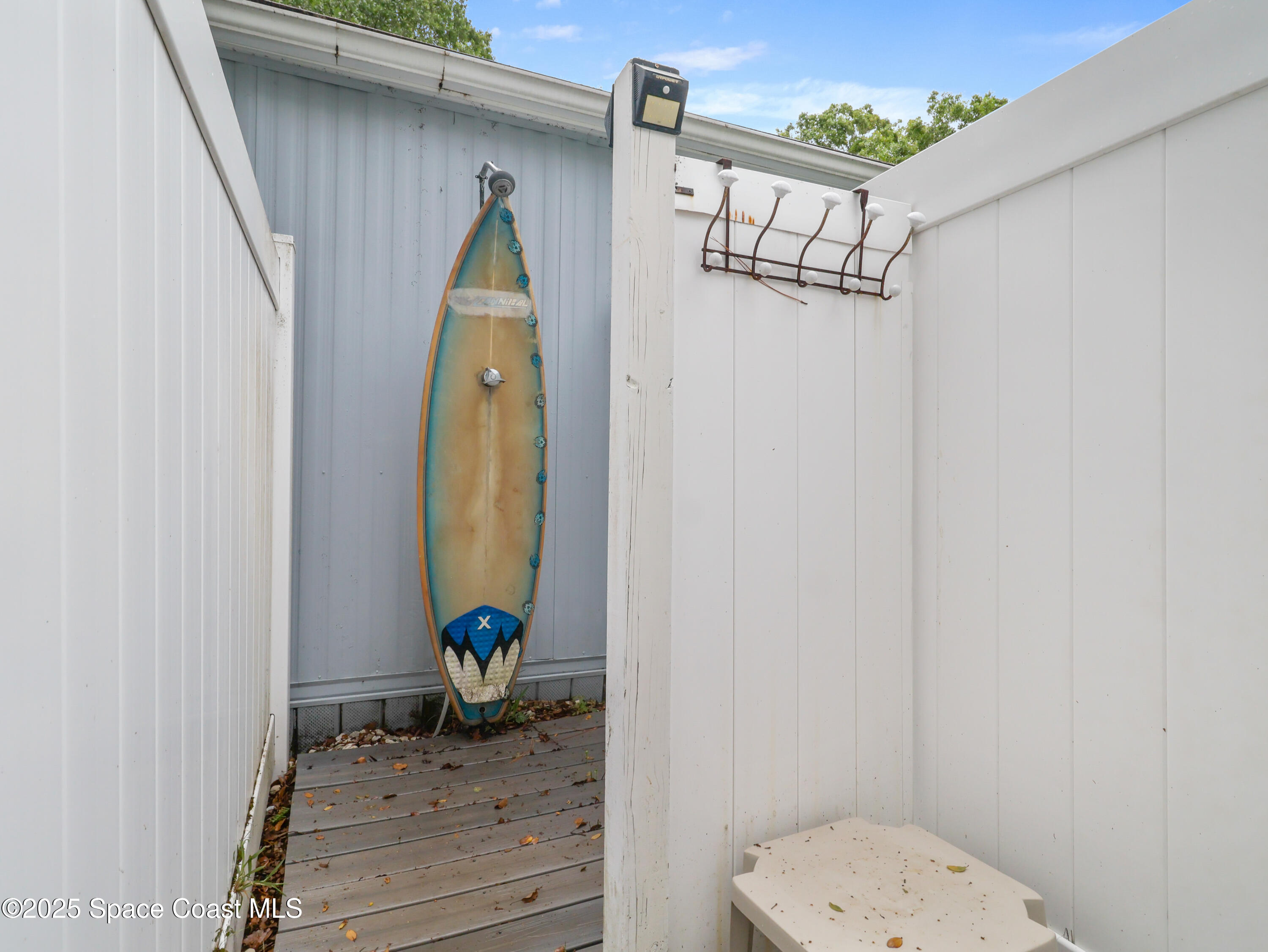 585 Canaveral Groves Boulevard Cocoa, FL 32926 - Photo 35 of 49 a view of a hallway with wooden door