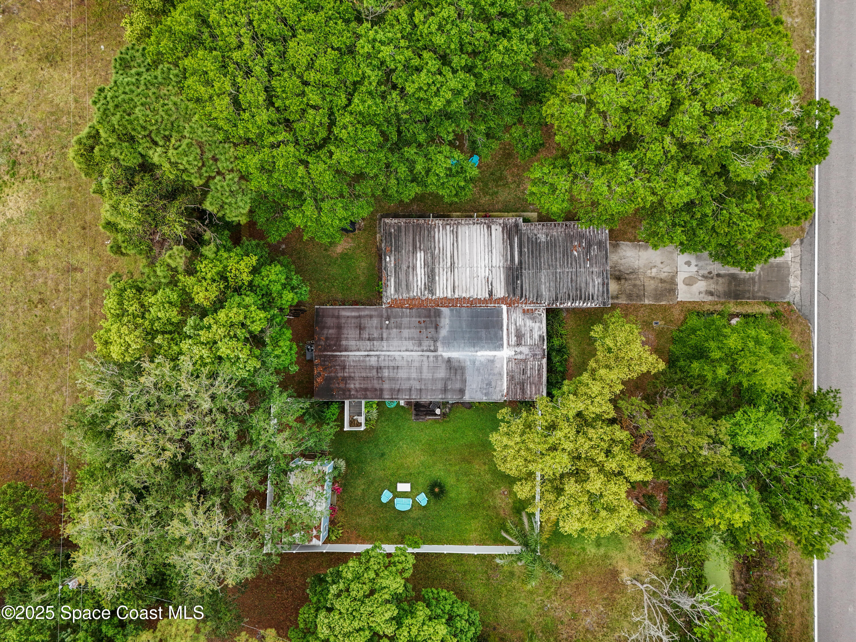 585 Canaveral Groves Boulevard Cocoa, FL 32926 - Photo 45 of 49 a view of a back yard