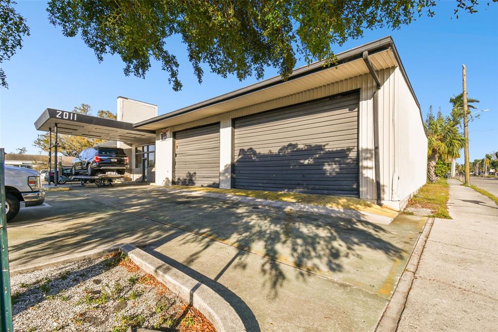 2011 9th Street West Bradenton, FL 34205 - Photo 2 of 24 a front view of a house with a yard