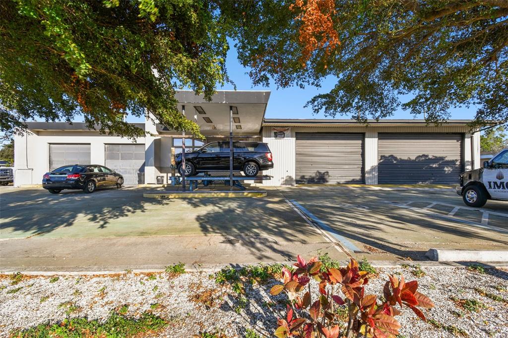 2011 9th Street West Bradenton, FL 34205 - Photo 5 of 24 a view of a house with a yard covered in snow