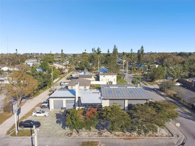 an aerial view of a city with lots of residential buildings
