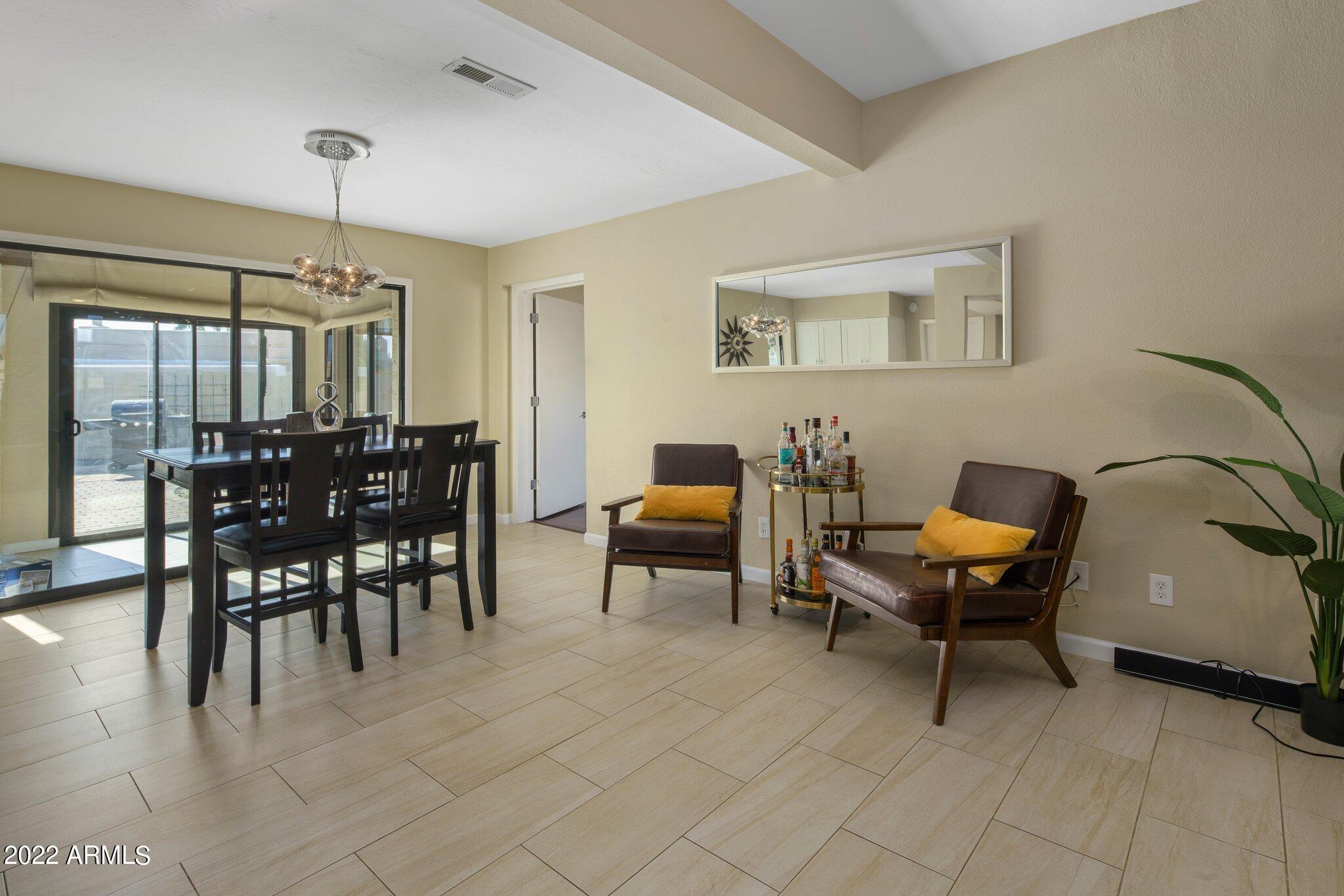 6609 East Phelps Road Scottsdale, AZ 85254 - Photo 49 of 83 a view of a livingroom with furniture and window