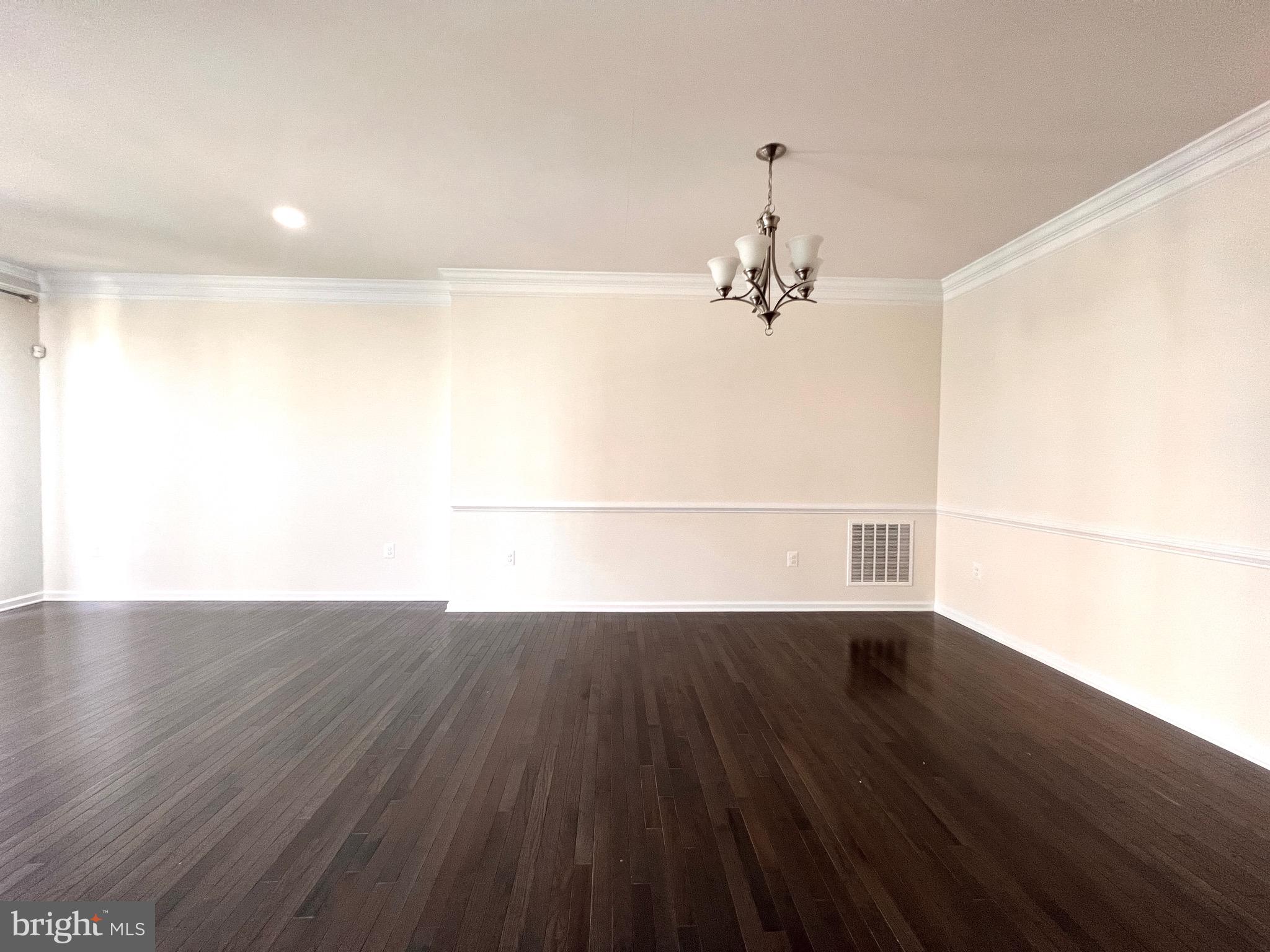 23480 Logans Ridge Terrace Ashburn, VA 20148 - Photo 11 of 66 a view of a room with wooden floor