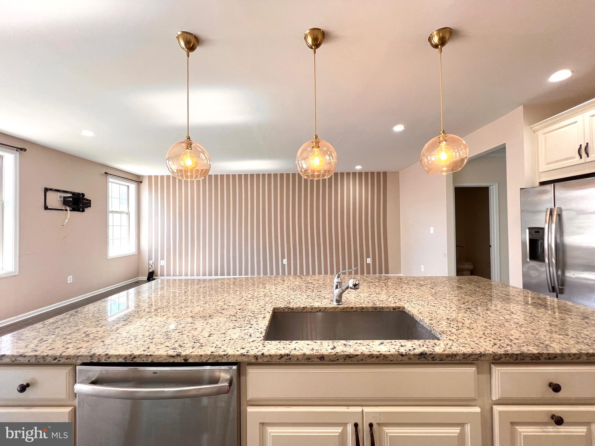 23480 Logans Ridge Terrace Ashburn, VA 20148 - Photo 18 of 66 a bathroom with a granite countertop sink and a large mirror