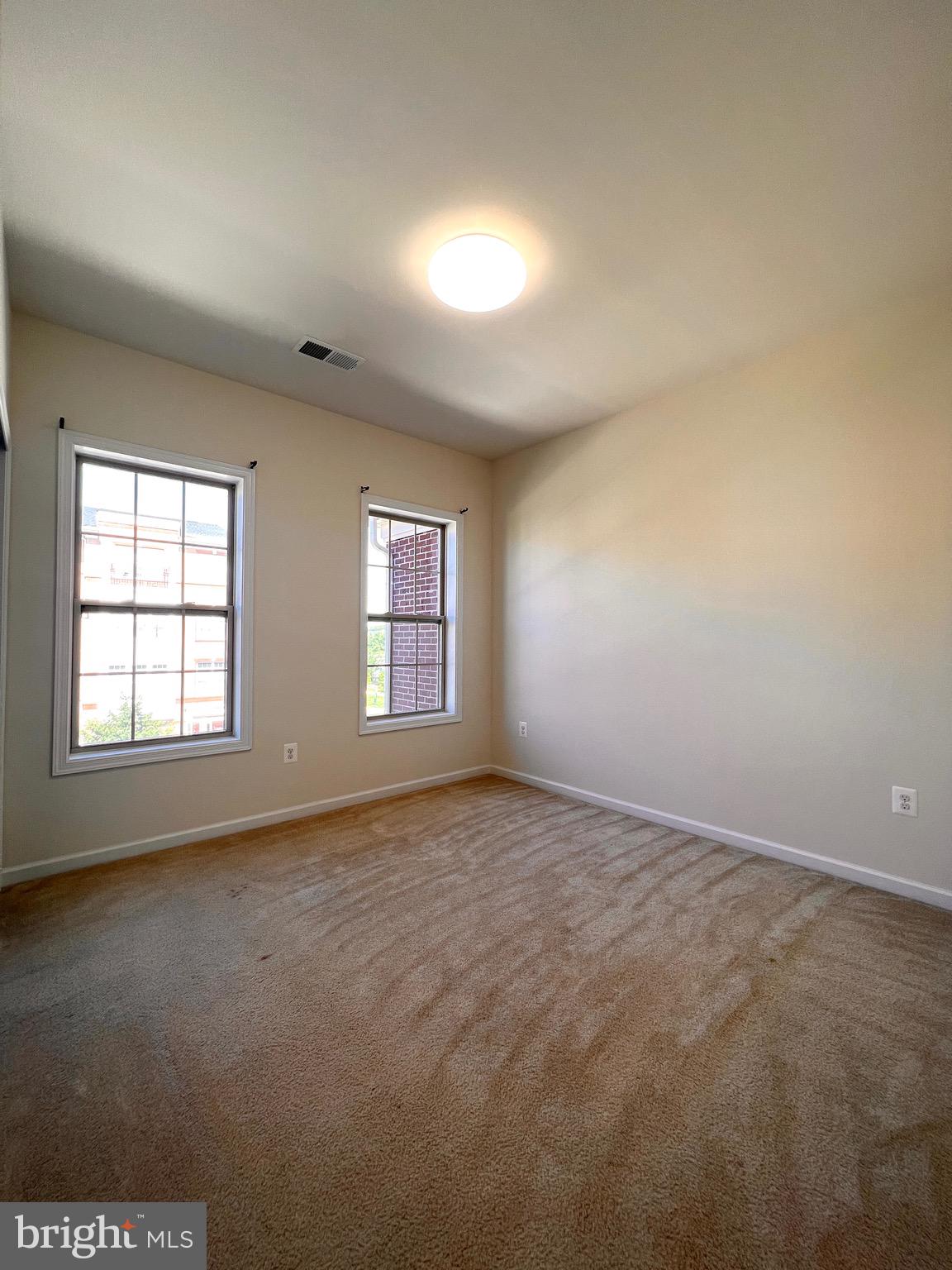 23480 Logans Ridge Terrace Ashburn, VA 20148 - Photo 36 of 66 an empty room with windows