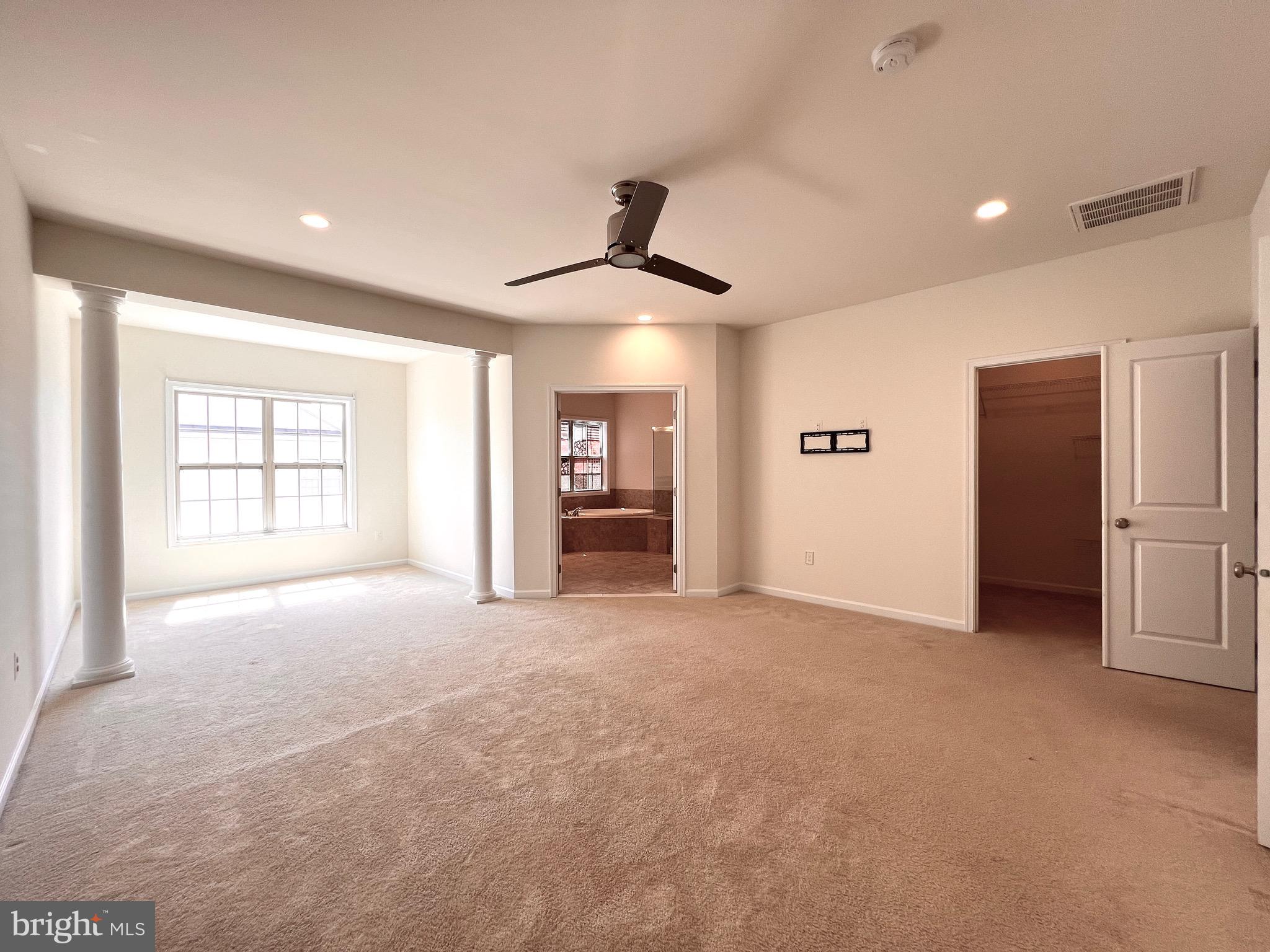 23480 Logans Ridge Terrace Ashburn, VA 20148 - Photo 44 of 66 a view of an empty room with a window