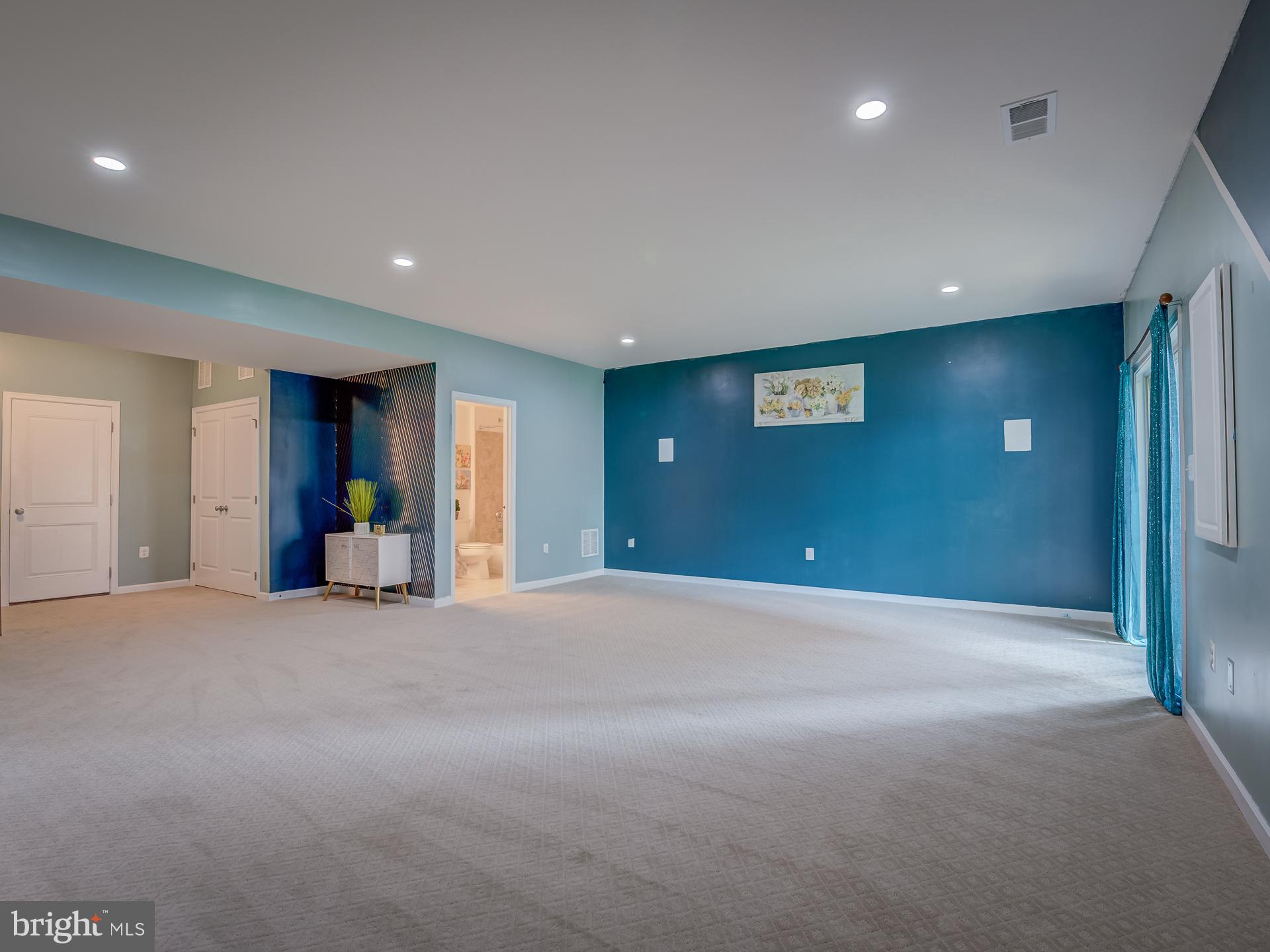 23480 Logans Ridge Terrace Ashburn, VA 20148 - Photo 54 of 66 a view of an empty room with closet and hallway