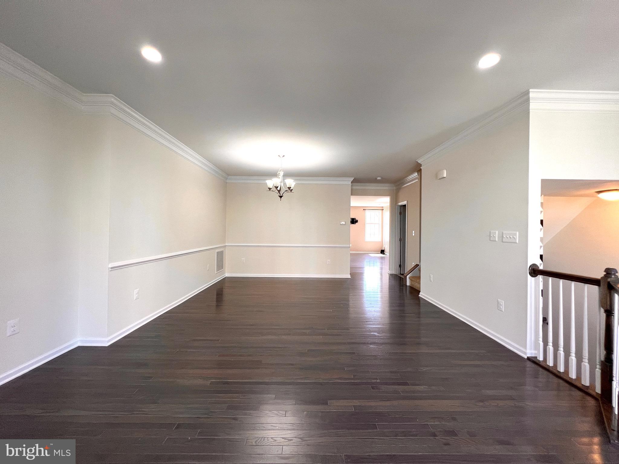 23480 Logans Ridge Terrace Ashburn, VA 20148 - Photo 6 of 66 a view of a room with wooden floors