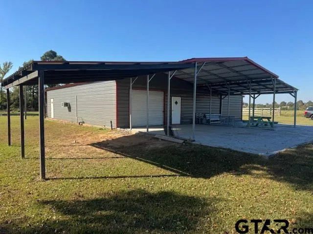 a view of a house with a swimming pool