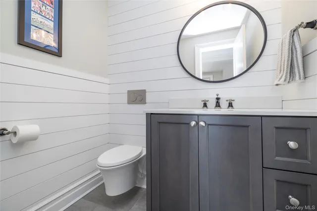 a room with furniture and a flat screen tv