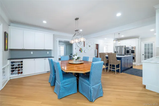 a bedroom with bed and a large window