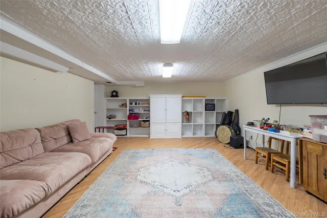 a view of a patio with table and chairs with wooden fence and plants