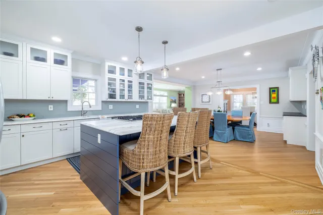 a view of a dining room with furniture and window