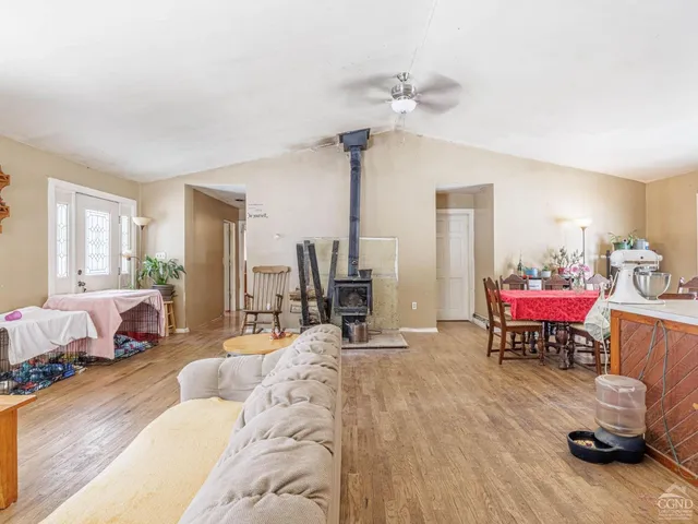 a kitchen with stainless steel appliances a sink stove and refrigerator
