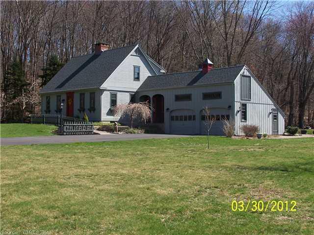 271 Cox Road Portland, CT 06480 - Photo 1 of 1 a front view of house with yard and green space