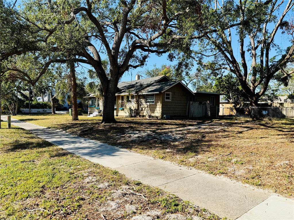 624 Goodrich Avenue Sarasota, FL 34236 - Photo 17 of 45 a front view of a house with a yard