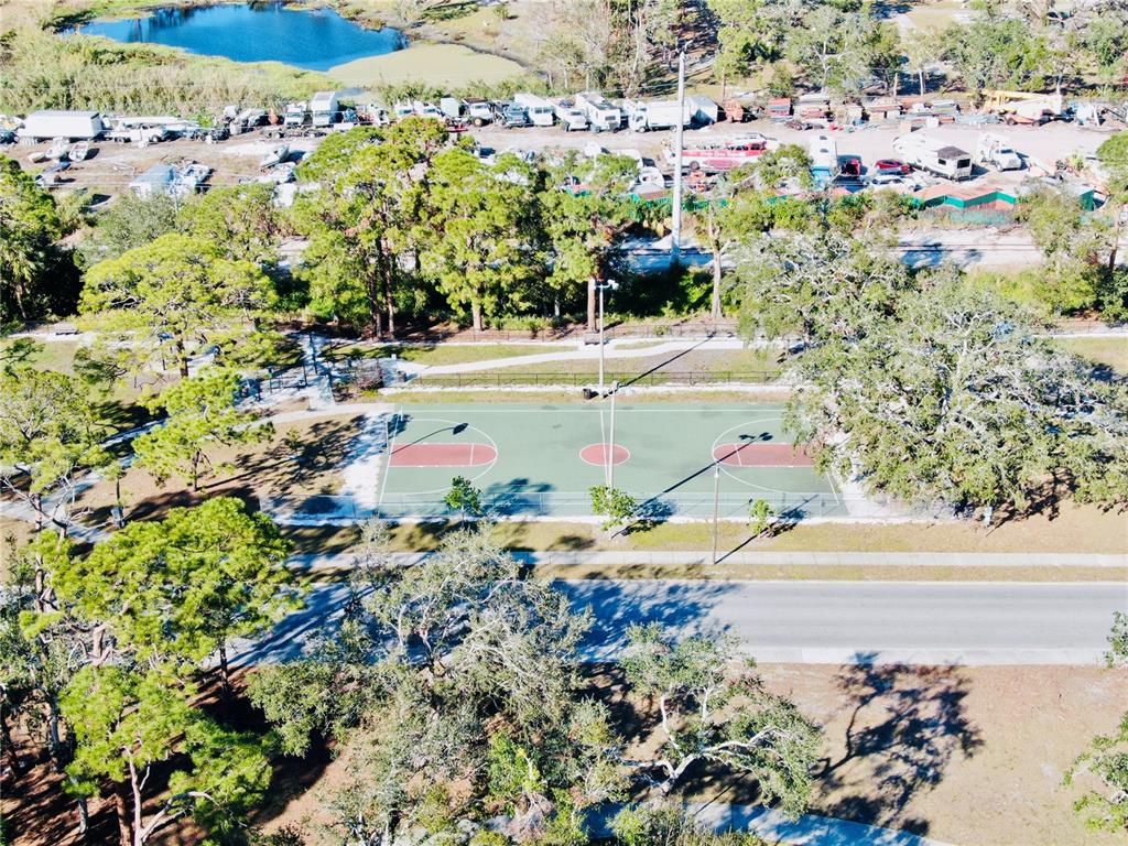 624 Goodrich Avenue Sarasota, FL 34236 - Photo 26 of 45 a view of a pathway with a flower