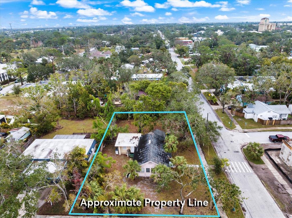 624 Goodrich Avenue Sarasota, FL 34236 - Photo 8 of 45 a view of a house with a yard