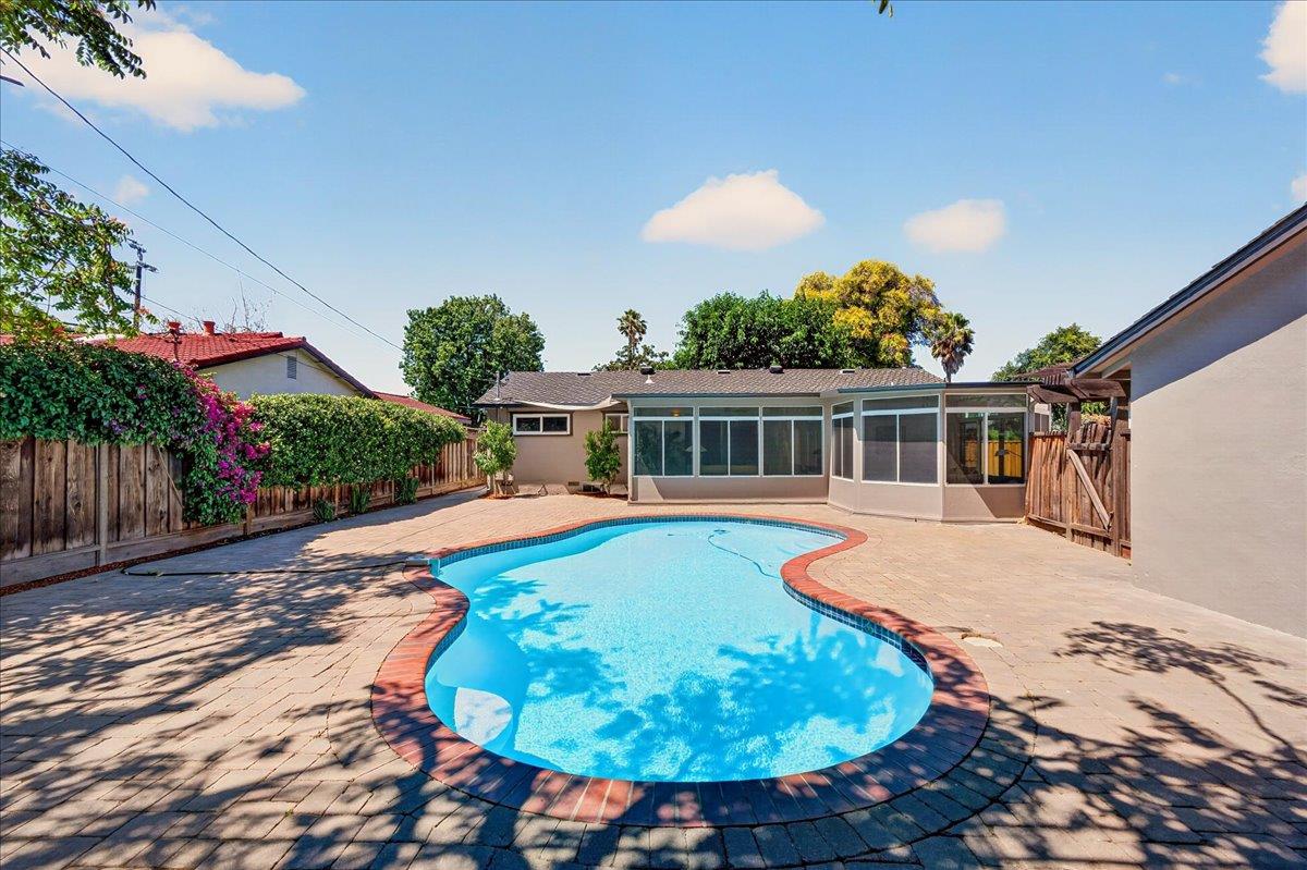 2130 Roenoke Way San Jose, CA 95128 - Photo 10 of 33 a view of a house with swimming pool
