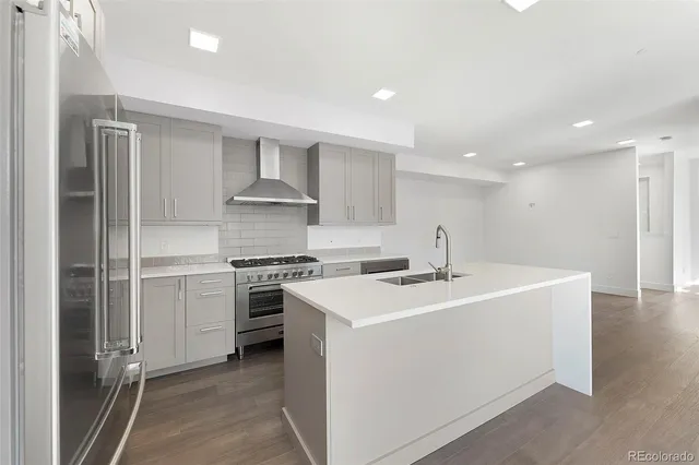 a bathroom with a double vanity sink and mirror