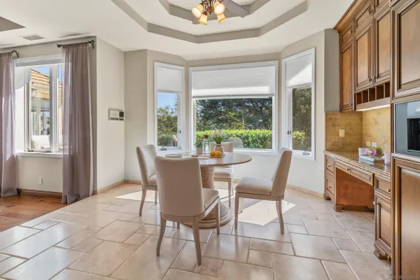 a view of a livingroom with furniture and a flat screen tv
